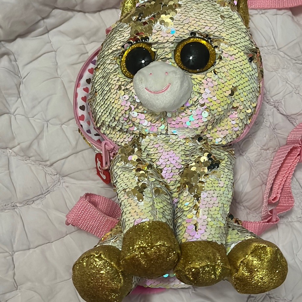 Specialty sequined unicorn backpack.